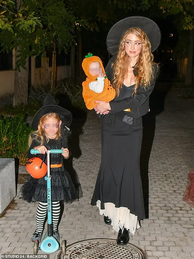 Amber Heard seen with twins for the first time as she goes  trick-or-treating in Madrid after fleeing US | Daily Mail Online
