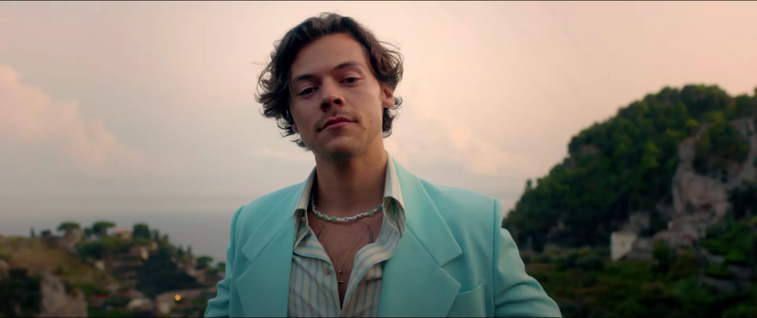 Catch Harry Styles' Long Locks Flowing in the Wind One Last Time in His New "Golden" Music Video